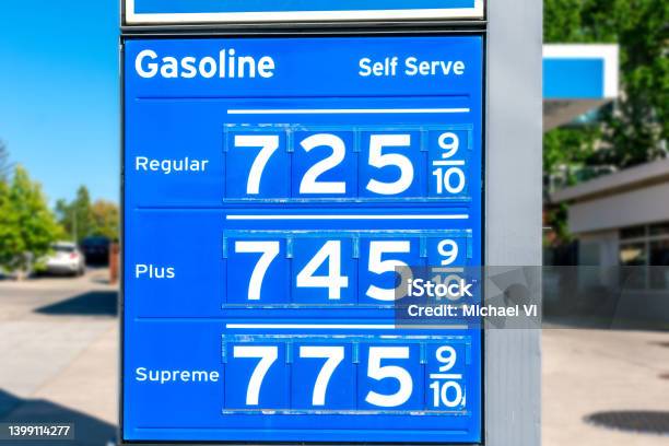 Gas Station Price Sign Showing High Gasoline Price For Over 7 Dollars A Gallon Of Regular Gas Stock Photo - Download Image Now