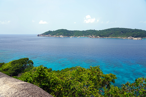 Beautiful view of bright blue waters of the Similan Islands of Thailand.