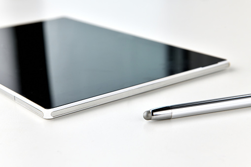 Touching pen for tablet and tablet device