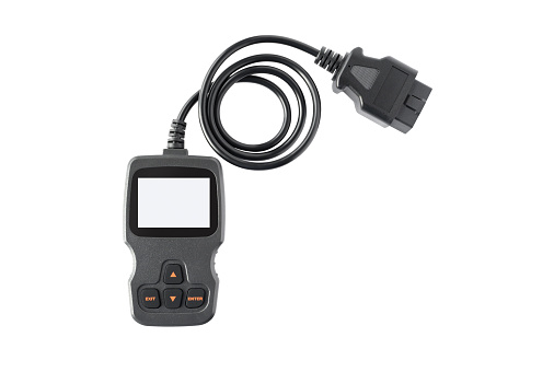 OBD2 scanner with backlit screen, isolated on white background.