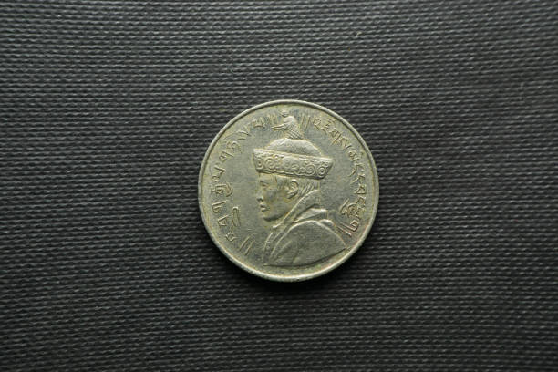 istock 1/2 Rupee coin dated 1928 Bhutan, Front view, Silver 1399121454