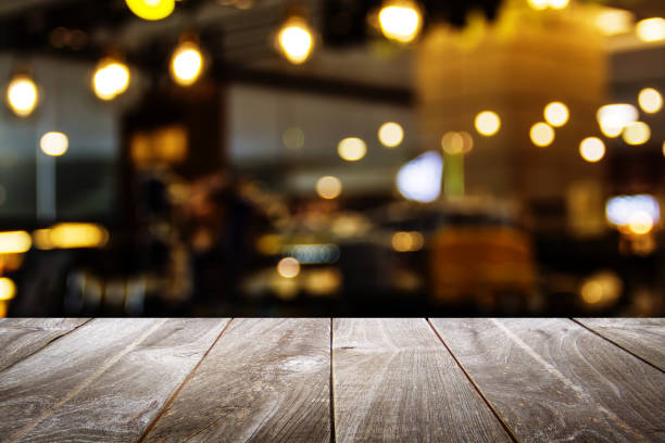 istock top wood table with Blur Background. 1399126405