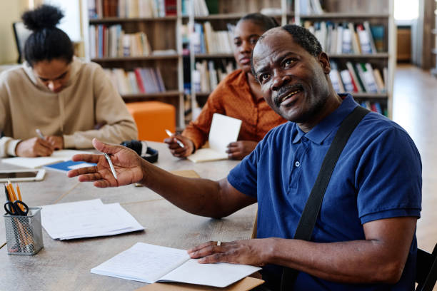 istock Mature Man Talking To Teacher 1399129566