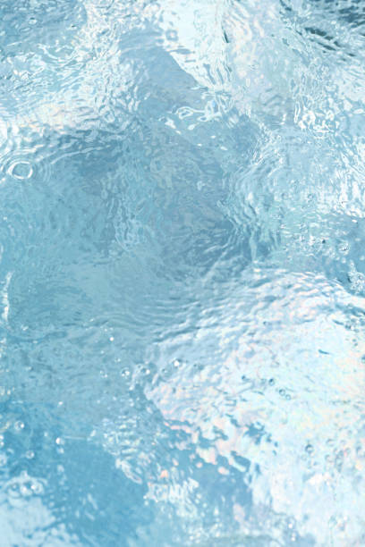 istock blue water surface with waves and bubbles. minimalistic fresh summer background for invitation or banner 1399129993