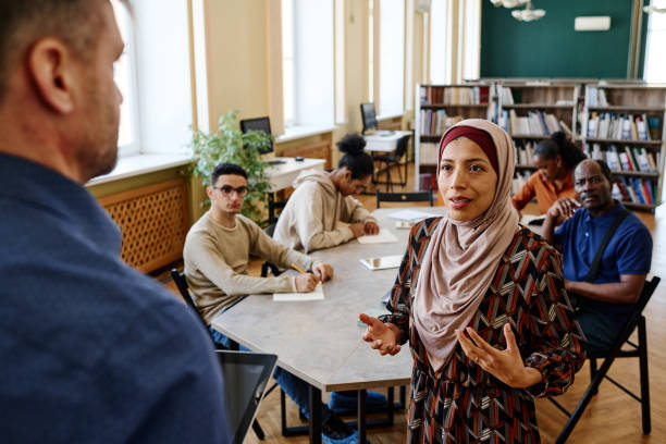 istock Muslim Woman Talking To Teacher 1399130893