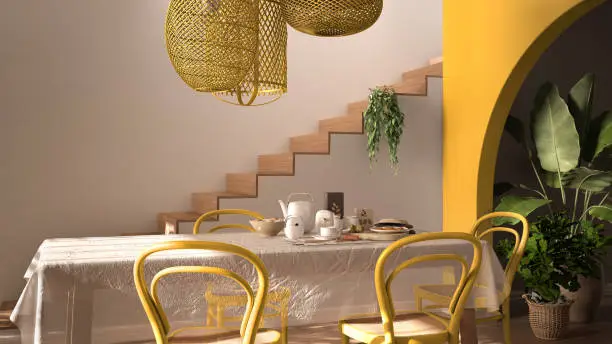 Vintage retro dining room with wooden table and chairs in yellow tones, breakfast buffet, rattan pendant lamps, parquet floor, archways with potted plants, staircase, interior design