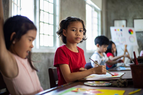 istock school girl writing in class 1399139040