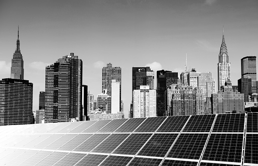 Solar Power Station over urban skyline, Manhattan, NYC, USA.