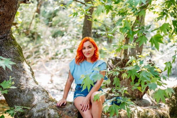 Free Stock Photo of Woman With Red Hair Standing in Front of Tree ...