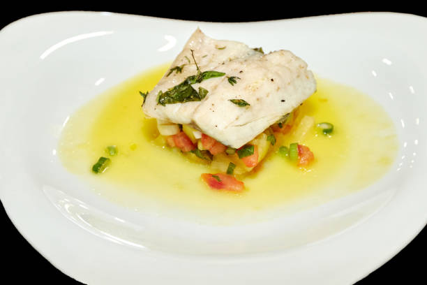 istock Fish fillet  with vegetables and sauce. Fish dish in a restaurant 1399143441