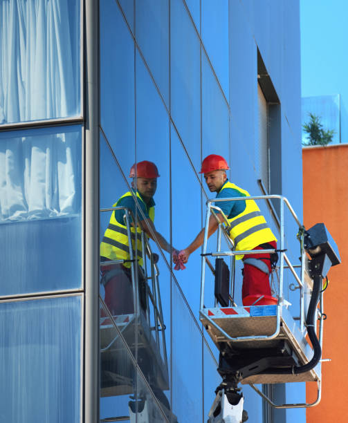 istock Cleaning windows on a residential building. 1399146498