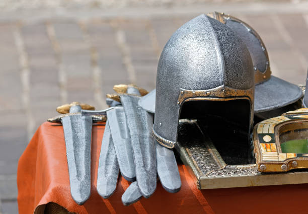 Daggers and Helmets at a Historical Reenactment stock photo