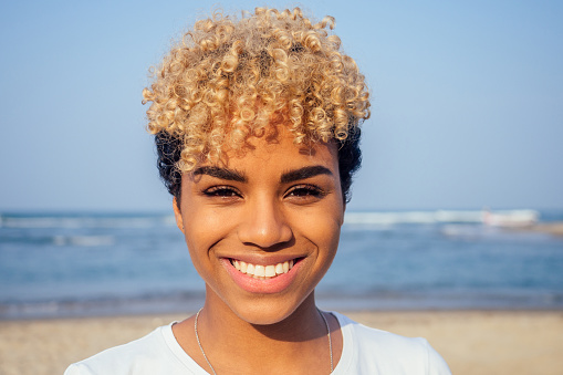 latin brazil young woman on beach at sundawn