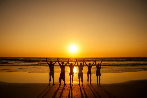 six health people in stand hatha position with hand up raced and breath full chest in goa india beach at sunset - yoga prana hatha water imagens e fotografias de stock