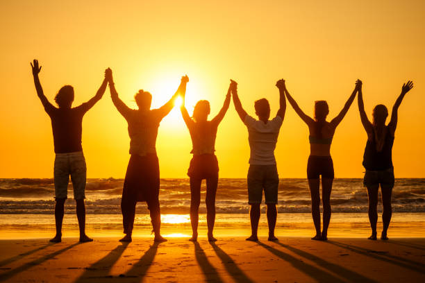 six health people in stand hatha position with hand up raced and breath full chest in goa india beach at sunset - yoga prana hatha water imagens e fotografias de stock