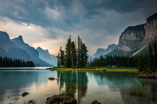 Beautiful Spirit Island in Maligne Lake in Jasper National Park, Alberta, Canada. The famous island is located in maligne lake and surround by the steep mountain peaks of the Canadian Rockies.