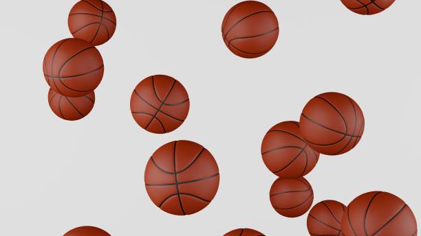 istock Many classic Basketball balls falling down on white background. 1399159011