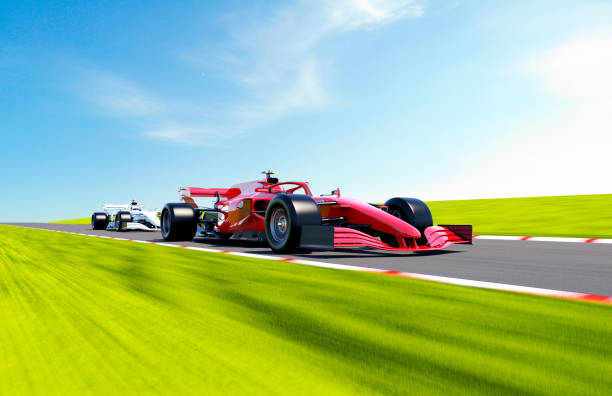 istock red race car leading on a race track 1399159884