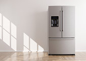 Refrigerator standing in empty room. Free, copy space for text or other objects. Household electrical equipment. Modern kitchen appliance. Stainless steel fridge with double doors, freezer. 3d render.