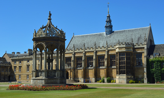Cambridge, Cambridgeshire, England - June 30, 2015: Trinity College Fountain and Chapel Cambridge University  England.