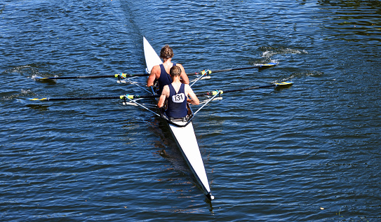St Neots, Cambridgeshire, England- July 28, 2018:  Ladies Sculling Pair on the River Ouse at St Neots.