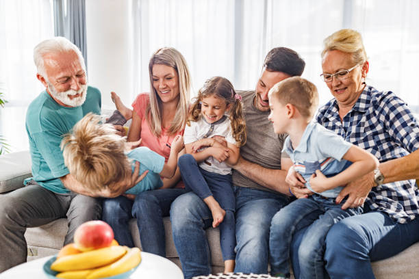 istock Cheerful extended family having fun together at home. 1399161593