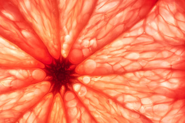 istock Close-up of sliced grapefruit, macro, creative background. 1399163018