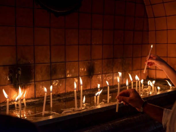 istock candles burning inside the church. christian ceremony. 1399164595