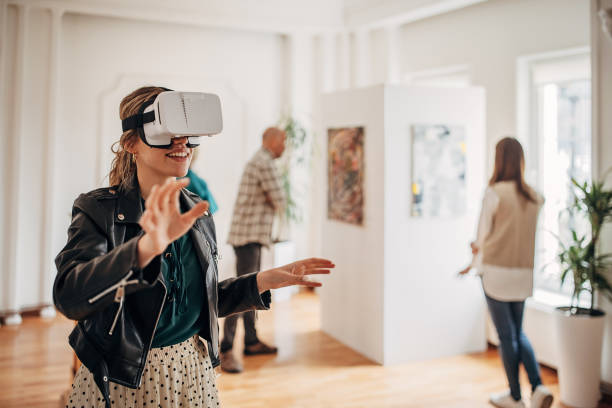 VR experience in art gallery stock photo