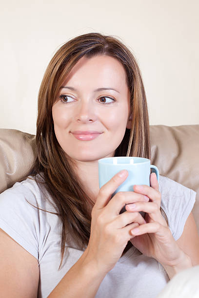 istock Beautiful woman enjoying her coffee 139917083