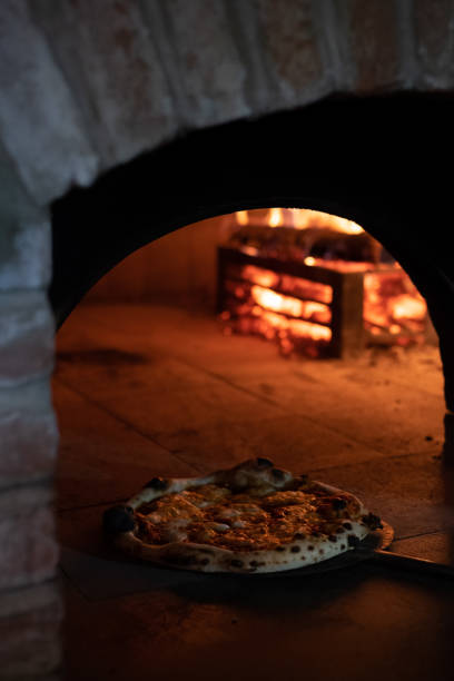 istock Margarita pizza and pizza oven 1399172836