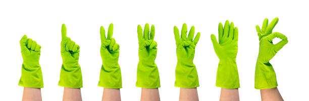 istock Set of hands in green protective rubber gloves isolated 1399173917