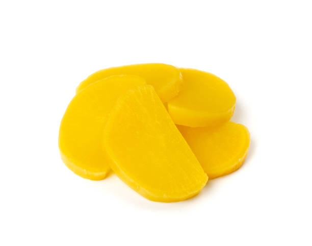 istock Pickled Daikon Bars Isolated, Marinated Yellow Radish 1399173921
