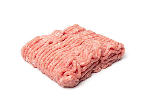 Minced pork meat isolated. Ground fresh fillet, uncooked pig mincemeat, raw forcemeat, farce minced meat portion on white background