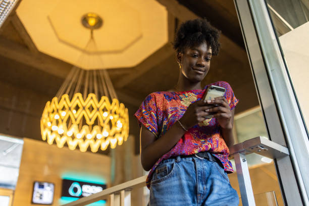 istock Young businesswoman Black ethnicity using mobile phone 1399175747
