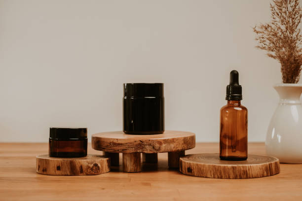 istock Cosmetics container set on wooden desk and grey beige natural background 1399176583