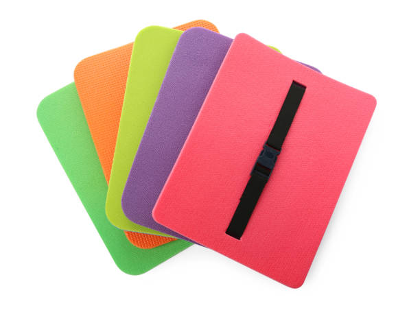 istock Bright foam tourist seat mats isolated on white, top view 1399177085