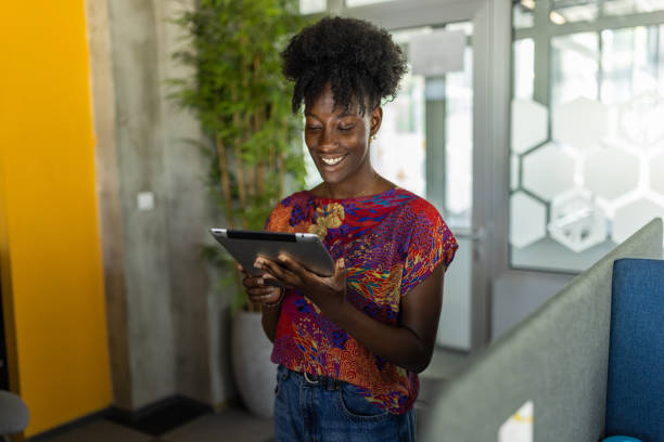 istock Young businesswoman Black ethnicity using digital tablet 1399177777