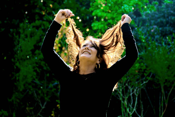 istock Redhead woman with backlit hair 1399178683