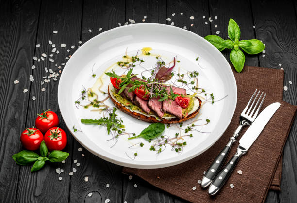 istock Bruschetta with tender beef, cream cheese and gluacomoli sauce 1399179410