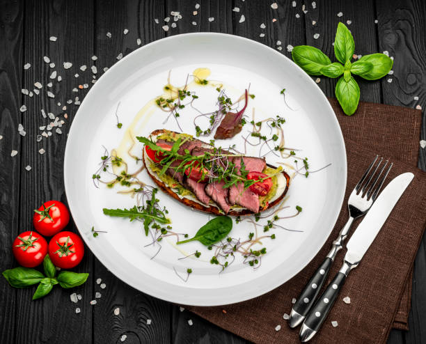 istock Bruschetta with tender beef, cream cheese and gluacomoli sauce 1399179413