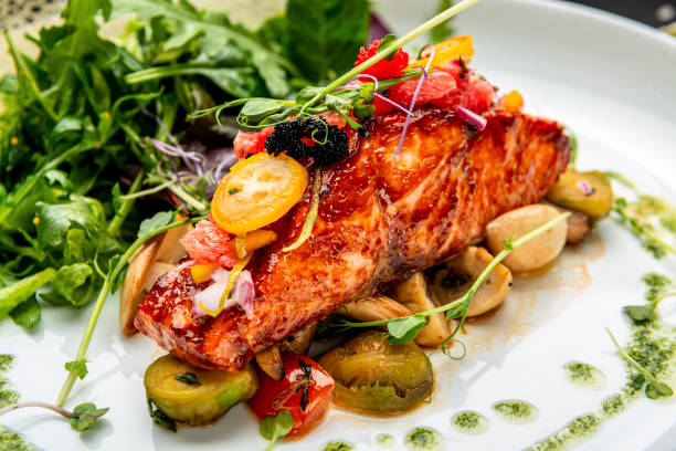 istock Grilled salmon fillet with vegetables mix. 1399179475