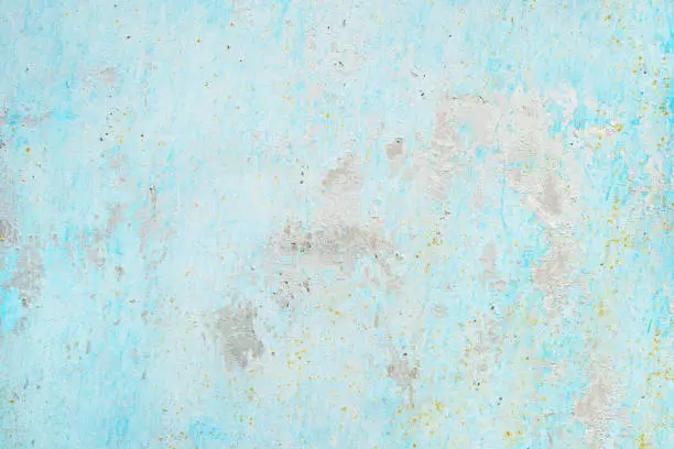 Photo of Light blue vintage texture. Old rough painted wall surface. Background with space for design.