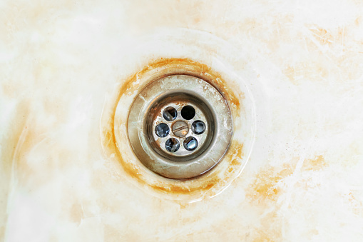 Image of a faucet spouting water. Useful image for any theme involving ecosystems, agriculture, drought, and conservation.