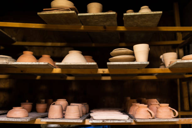 istock Various types of ceramics on shelf in pottery workshop 1399181993