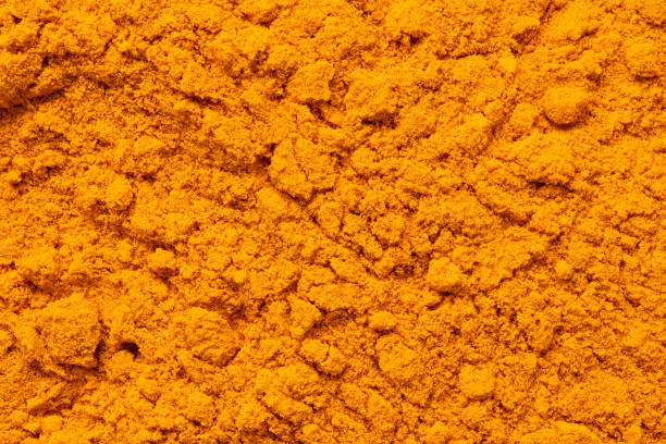 istock Background of ground turmeric from above. 1399183069