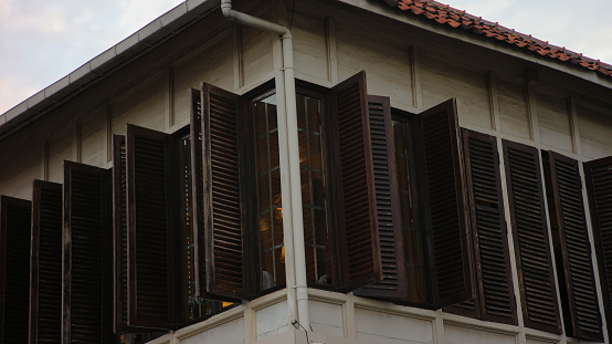 Jakarta, Indonesia - May 22, 2022: The old window of a cafe building in Jakarta, in the tourist area of ​​the old city looks very unique and antique