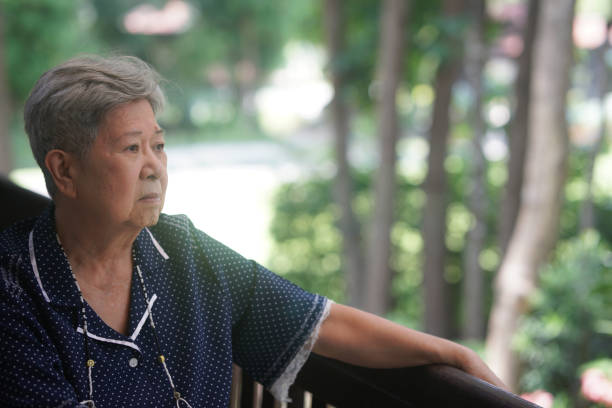 istock old elderly elder senior woman resting relaxing on balcony 1399187741