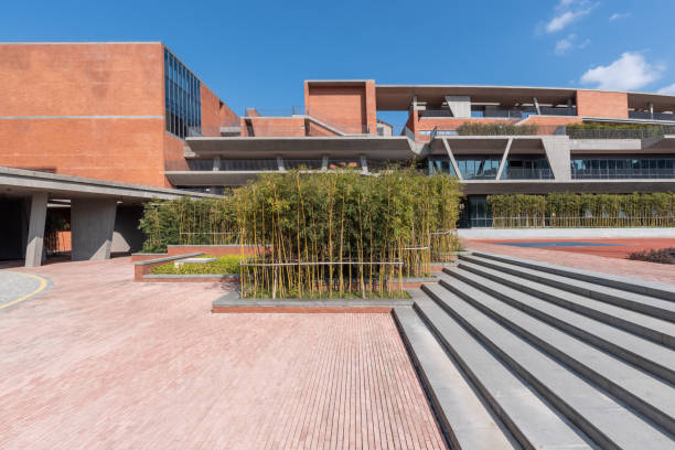 istock Square and greening of modern buildings with red bricks 1399188187