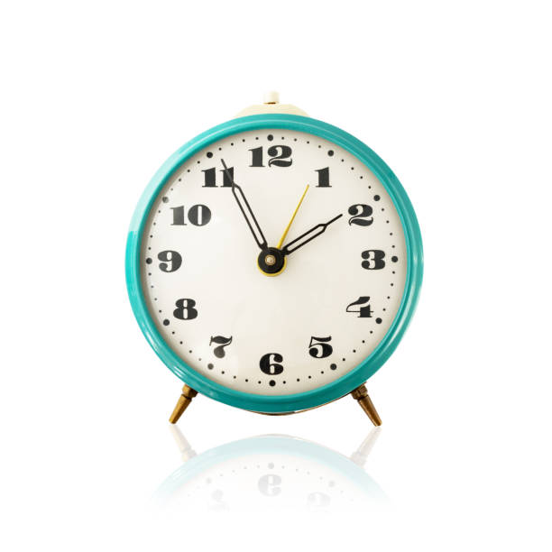 istock Old mechanical alarm clock isolated on white background with reflection. Vintage blue metal classic analog alarmclock, retro watch isolate. 1399188662